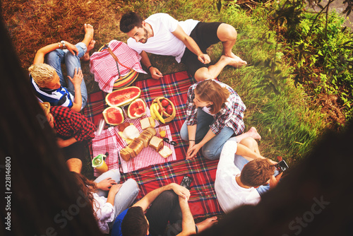 top view of group friends enjoying picnic time