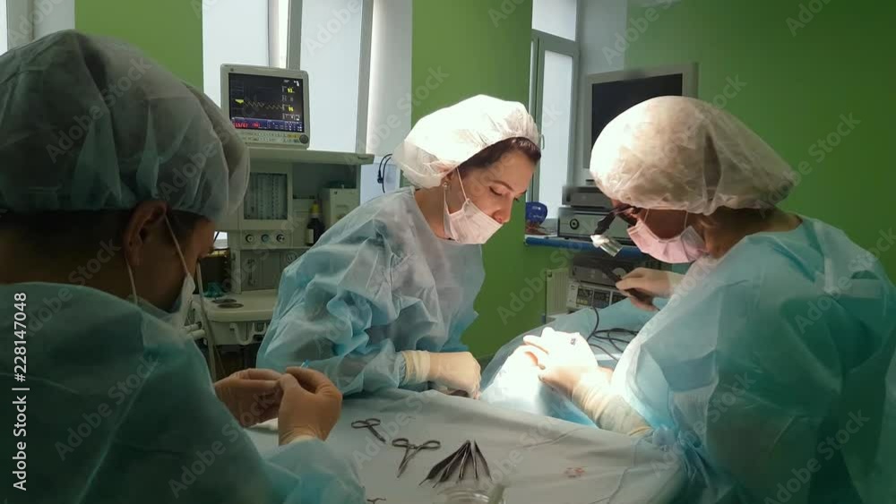 The surgeon is performing an operation on the eyes, close-up. Correction of. The doctor does blepharoplasty. Operation in the operating room. The surgeon is performing an operation on the eyes, close-up. Correction of. The doctor does blepharoplasty. Operation in the operating room.