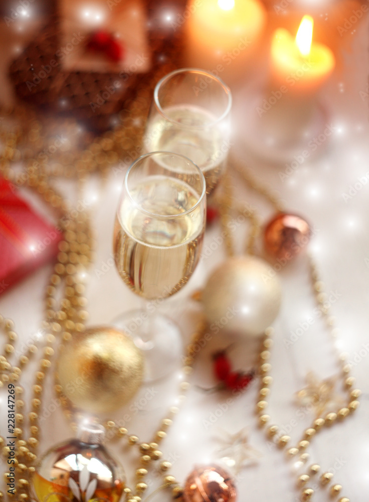 new years eve party table with champagne ,candles,tree decorations/Christmas and New Year background new years eve party table with champagne ,candles,tree decorations/Christmas and New Year background