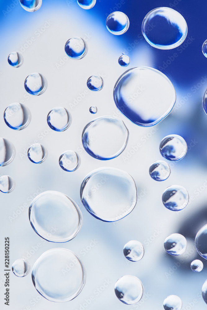 beautiful transparent water drops on blurred abstract background beautiful transparent water drops on blurred abstract background