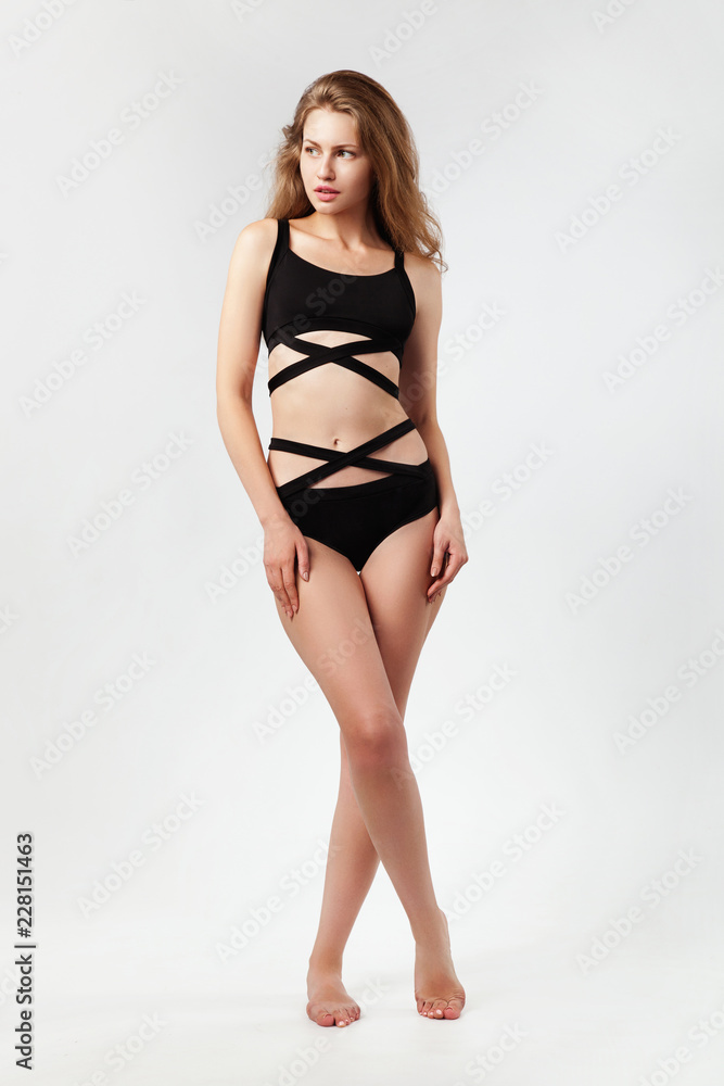 Fototapeta premium Beautiful woman in black bikini