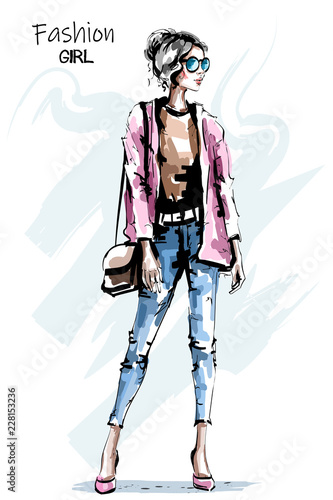Hand drawn beautiful young woman with bag. Stylish autumn outfit. Fashion woman look. Sketch.