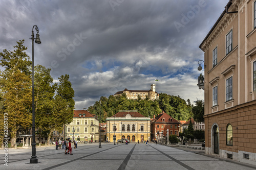 Kongresni trg square in Ljubljana with prominent buildings and castle in background, Slovenia