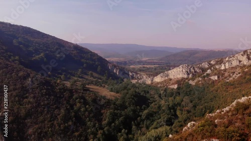 Aerial view of mountains in national park Cheile Nerei Beusnita in Romania. Part of Carpathian mountains with beautiful autumn colors.