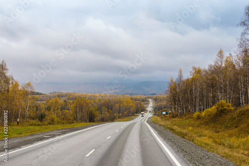 autumn view of the highway from the cab