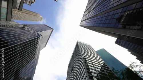 looking up at modern skyscraper buildings in NYC New York City Manhattan wall street