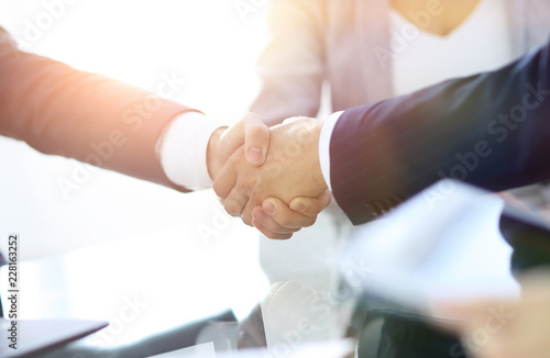 confident handshake of business partners