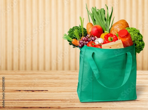 Full shopping  bag, isolated over  background
