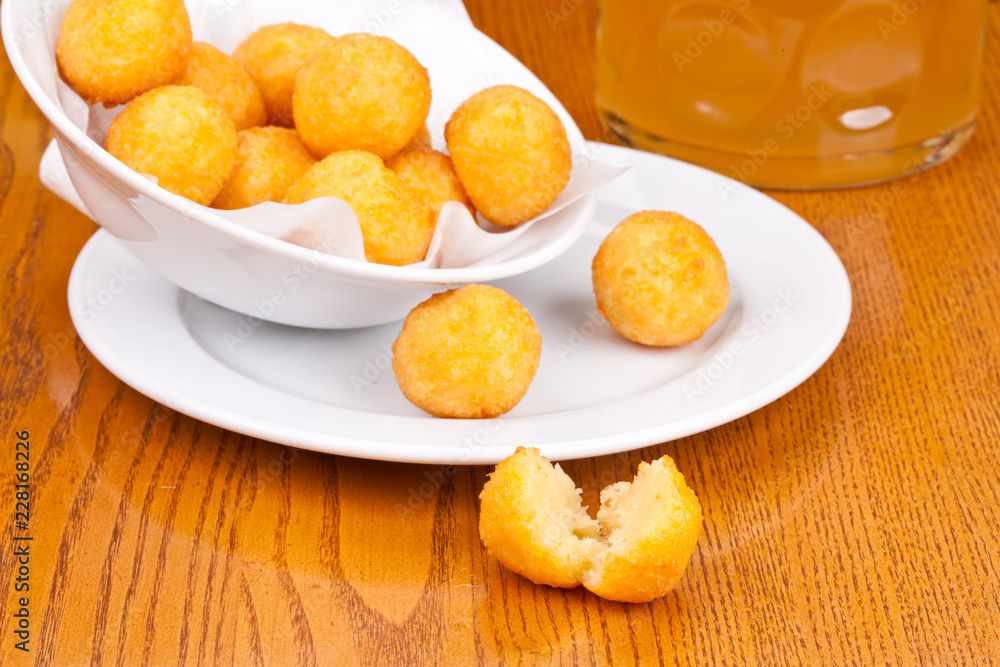 Deep fried cheese balls on white plate. Close up Deep fried cheese balls on white plate. Close up