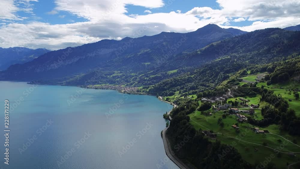 Aerial panoramic view of lake Thun (Thunersee), picturesque scenery of mountains (Bernese Alps), late summer - landscape panorama of canton of Bern from above, Switzerland, Europe Aerial panoramic view of lake Thun (Thunersee), picturesque scenery of mountains (Bernese Alps), late summer - landscape panorama of canton of Bern from above, Switzerland, Europe