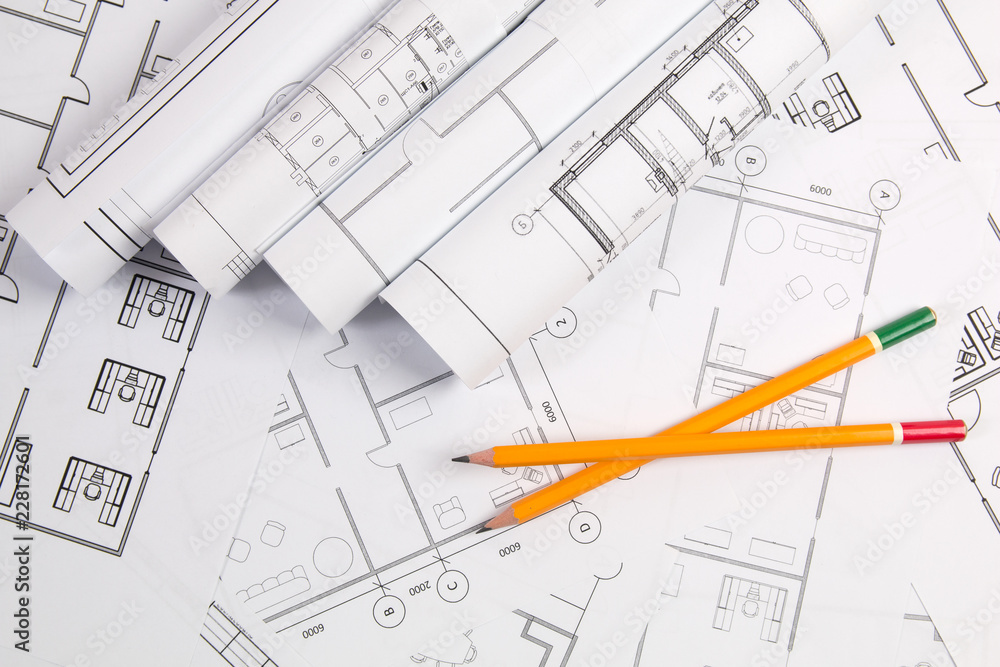 Pencils and paper еngineering house drawings and blueprints. Pencils and paper еngineering house drawings and blueprints.