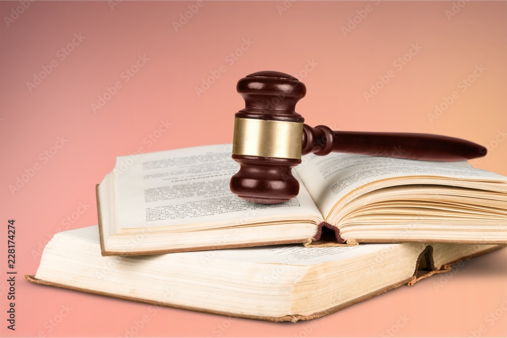 Judges gavel and scales justice on background Judges gavel and scales justice on background