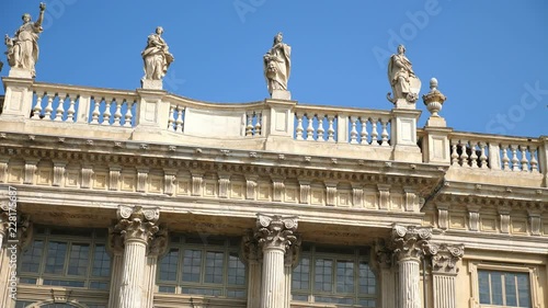 TORINO, ITALY - JULY 7, 2018: beautiful architecture of Turin city in Piedmont region in Italy. graceful statues on the facade of the house photo