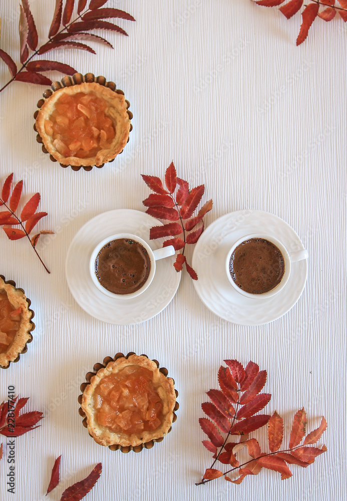 Mini apple cakes with cup of coffee. Enjoy autumn, colors. Keep memories of this autumn. Decorate leafs Mini apple cakes with cup of coffee. Enjoy autumn, colors. Keep memories of this autumn. Decorate leafs