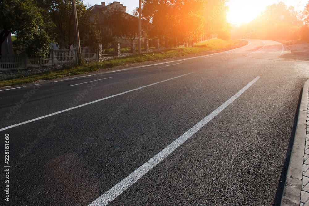 Asphalt road with marking lines white stripes