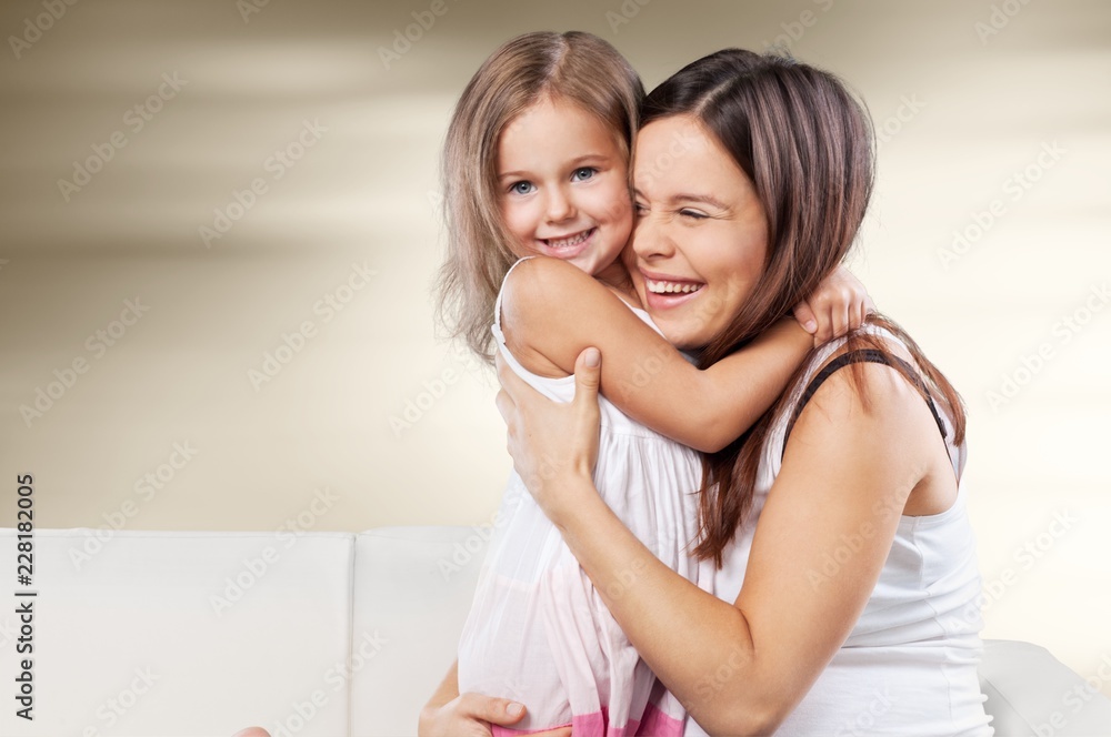Happy Mother and daughter hugging Happy Mother and daughter hugging