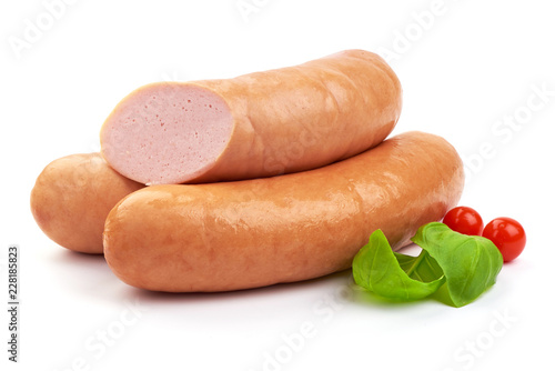 Oktoberfest boiled sausages with basil, isolated on white background.