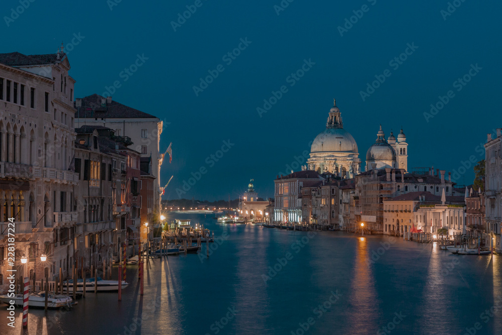 Grand Canal and Santa Maria della Salute in Venice, Italy at night