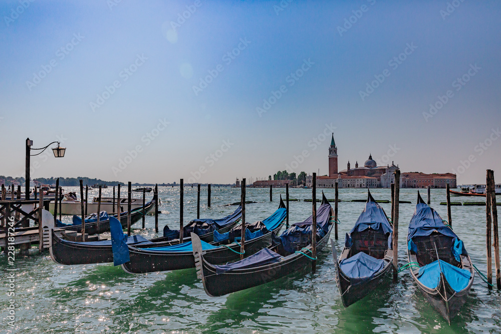 Gondolas by St. Marks Square and San Giorgio Maggiore in Venice, Italy