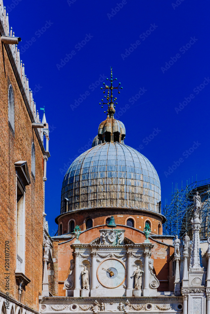 Details of the Doge's Palace and the dome of the St. Mark's Basilica, in Venice, Italy