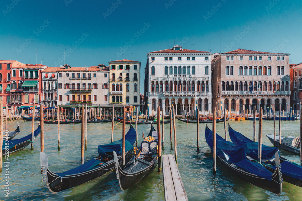 Gondolas and Venetian houses by the Grand Canal of Venice, Italy