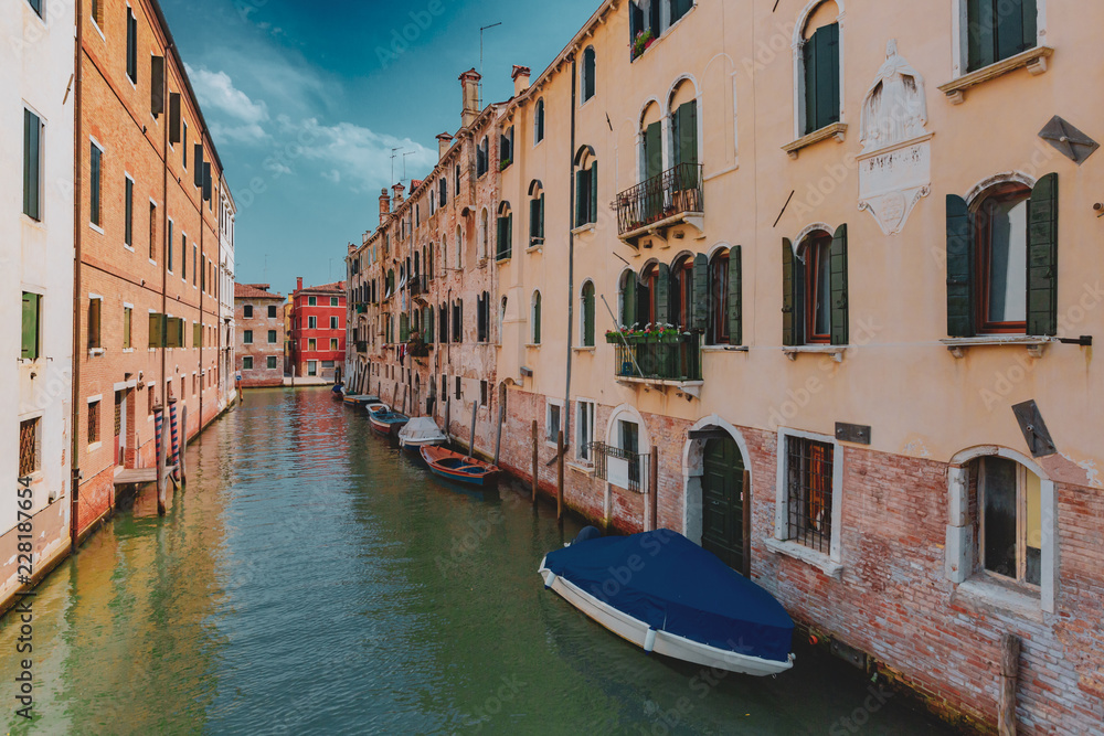 Venetian buildings by canal in Venice, Italy