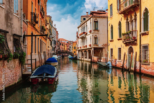 Venetian buildings by canal in Venice, Italy © Mark Zhu