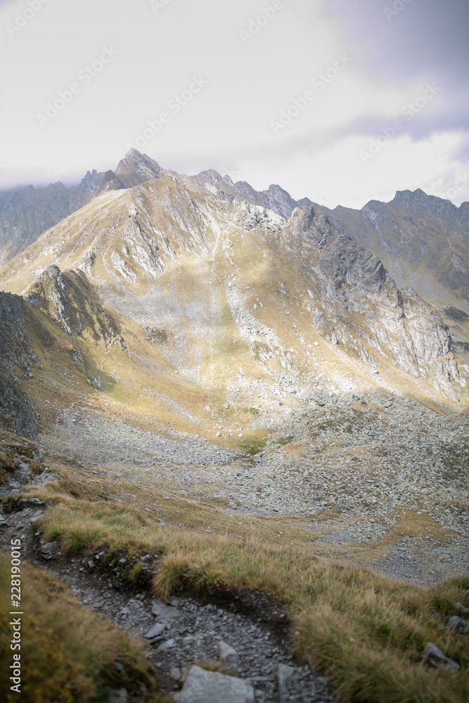 Mountain peaks and trails in summer time. Romania Mountain peaks and trails in summer time. Romania