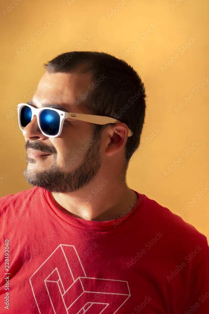 man with red shirt and sunglasses man with red shirt and sunglasses