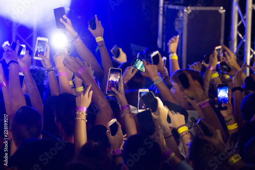 fans holding cellphones