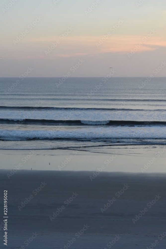 Sunrise waves beach