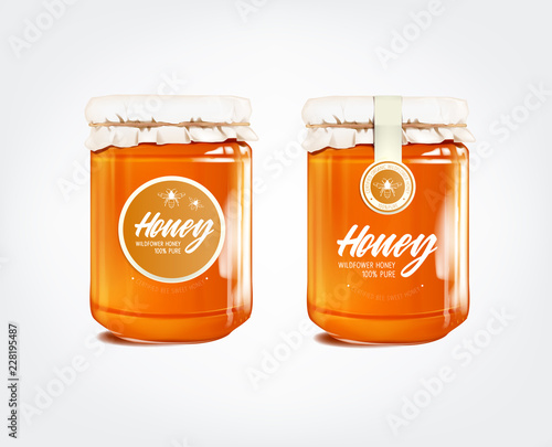 Honey in glass jar isolated with label.