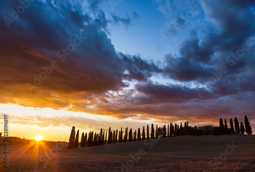Beautiful sunset over fields in Tuscany, Italy