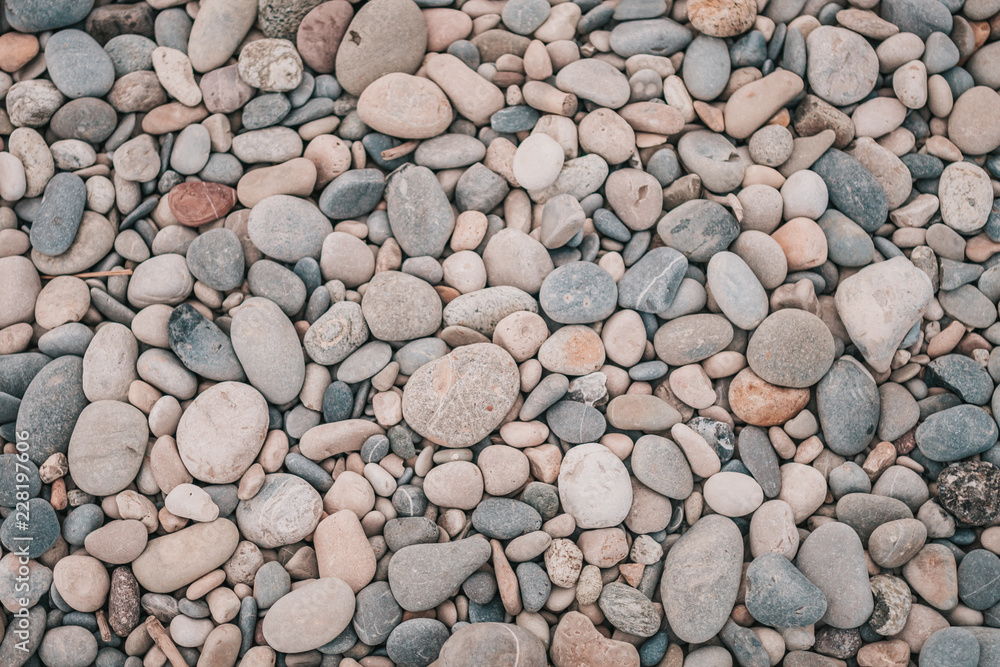 Cagnes-sur-Mer, France, September 23, 2018: Pebbles closeup on the seashore Cagnes-sur-Mer, France, September 23, 2018: Pebbles closeup on the seashore
