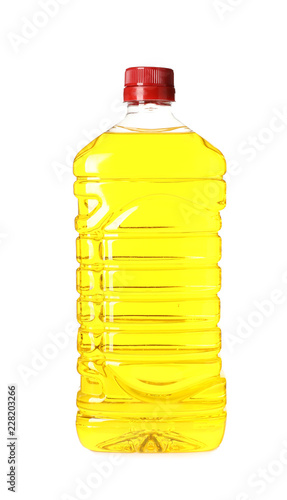Fototapeta Naklejka Na Ścianę i Meble -  Plastic bottle of oil on white background