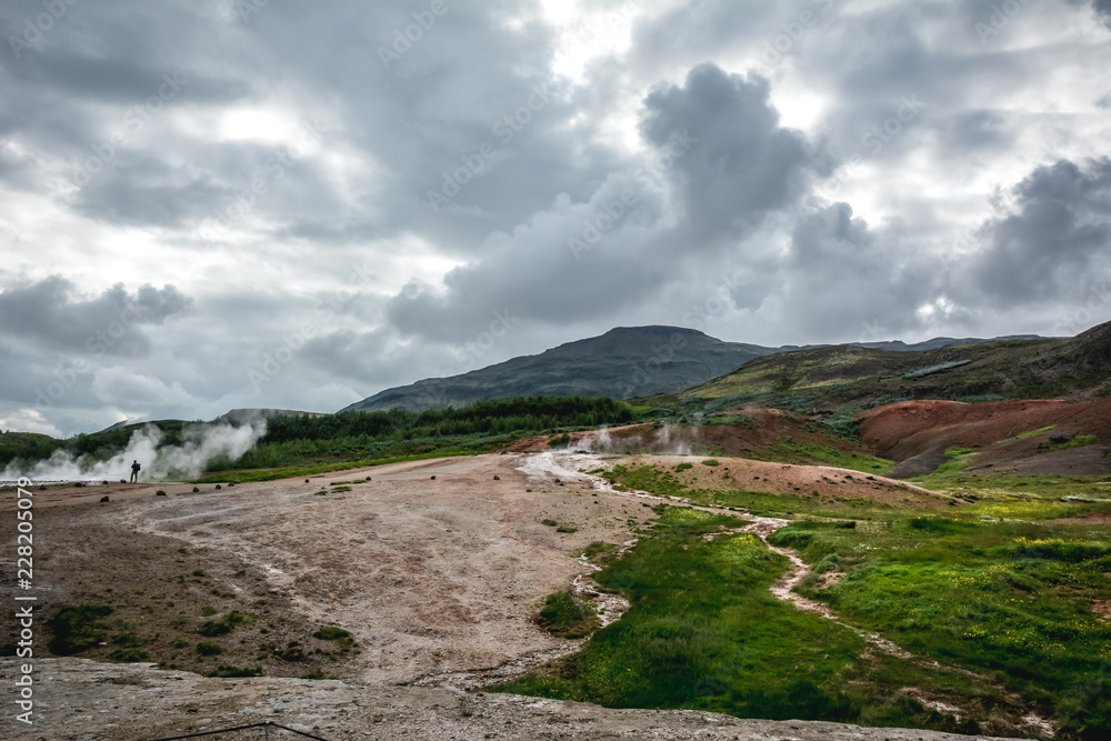 Geyser Park in Iceland, hot steam coming from the ground