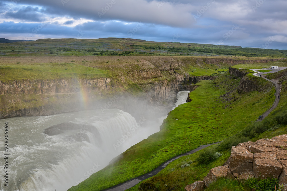 Gullfoss waterfall with rainbow in summer in Iceland, Europe