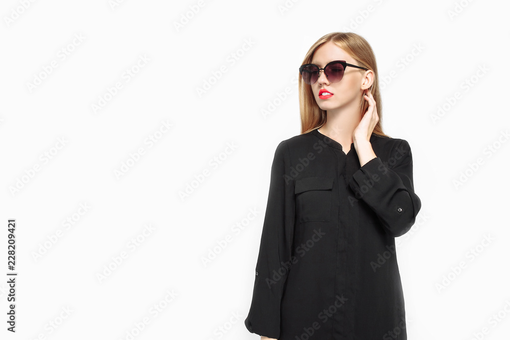 Elegant woman in sunglasses in black dress and with red lips, waiting For black Friday on white background Elegant woman in sunglasses in black dress and with red lips, waiting For black Friday on white background