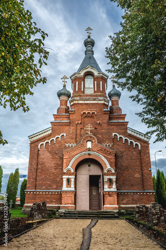 Path to St Nikolai orthodox church (Krustpils Sv.Nikolaja pareizticigo baznica), in Krustpils, Latvia with beautiful blue sky in the background.  photo