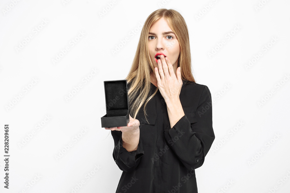 Shocked girl in black dress and with red lips, holding empty case, for jewelry, black Friday, Shocked girl in black dress and with red lips, holding empty case, for jewelry, black Friday,