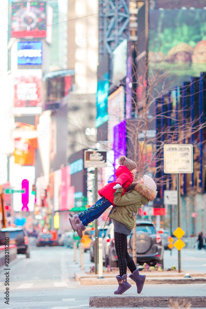 Happy mother and little girl on Manhattan, New York City, New York, USA.