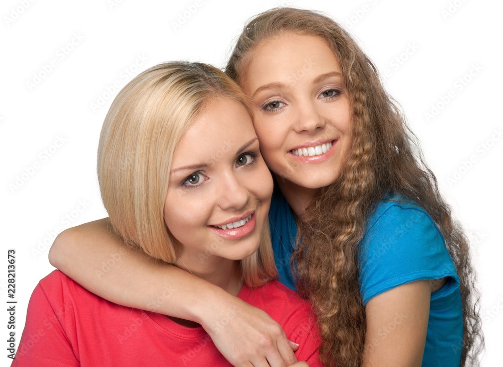 Portrait of Two Girlfriends / Sisters Hugging Portrait of Two Girlfriends / Sisters Hugging