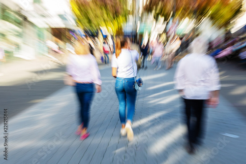 women walking in the pedestrian zone of a city