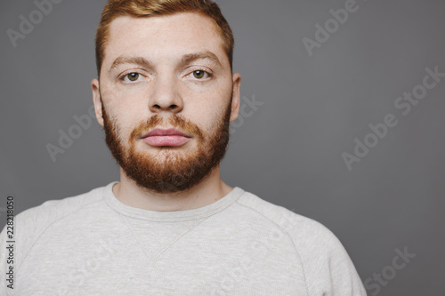 Serious guy with ginger beard