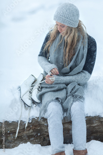 Happy young woman walking in winter time