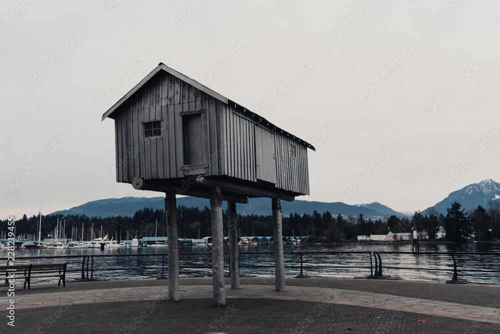 Coal harbour bay - waterfront in downtown with mountains in background. Coal harbour bay - waterfront in downtown with mountains in background.