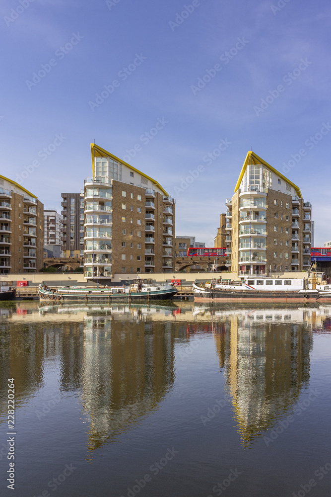 Boats at Limehouse Basin Marina, near Canary wharf riverside, London city, UK
