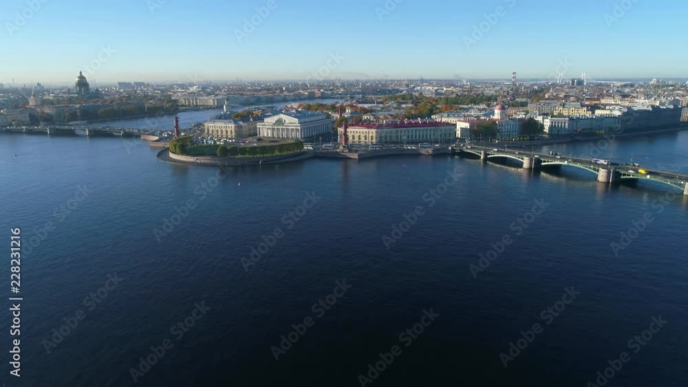 View of the arrow of Vasilievsky island on a Sunny October morning. Saint Petersburg (aerial video) View of the arrow of Vasilievsky island on a Sunny October morning. Saint Petersburg (aerial video)
