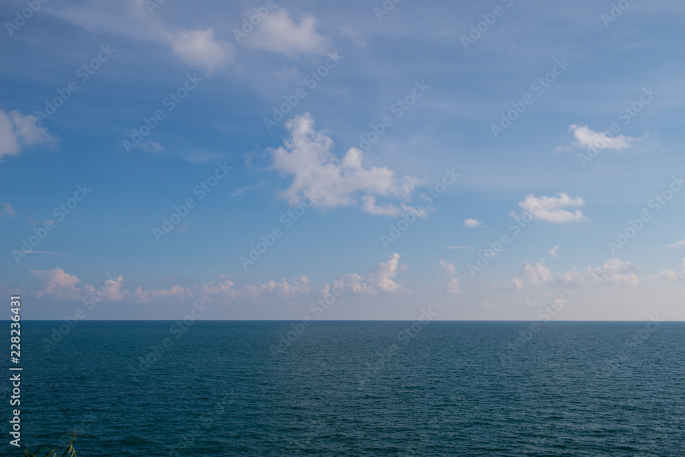 clouds blue sky above ocean and sea waves clouds blue sky above ocean and sea waves
