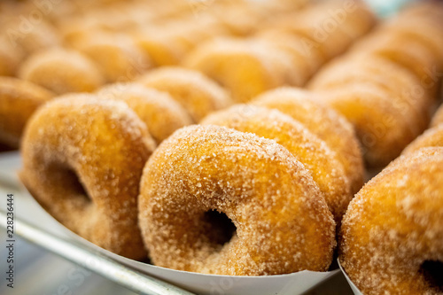 Canvas Print Sweet cider donuts freshly baked and brown